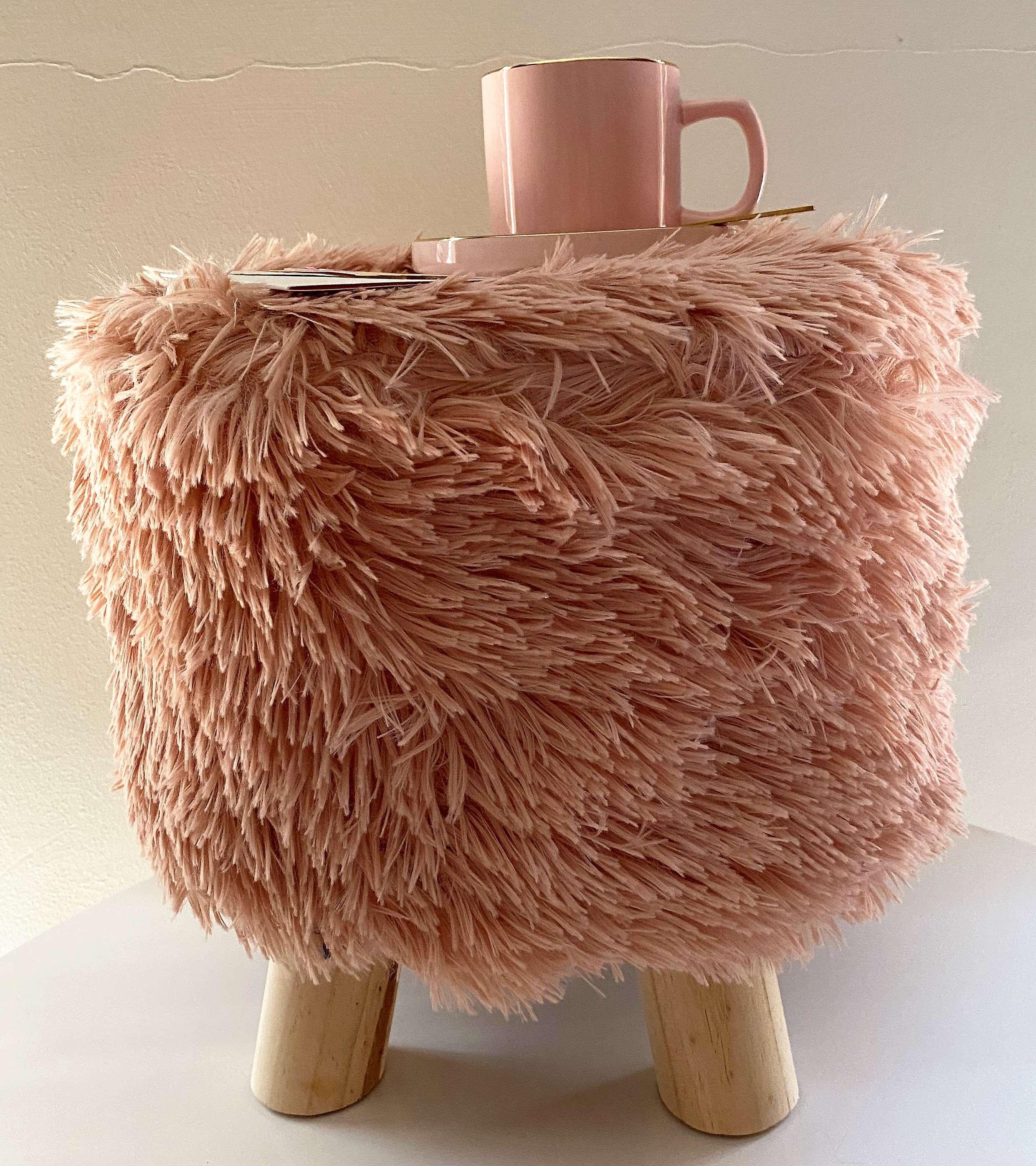 pink-fluffy-footstool